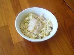 500g cabbage, coarsely shredded 1 onion, chopped 2 garlic cloves 2 fresh chillies, seeded and chopped 3 curry leaves 1 tbs olive oil 2 strips lemon rind 1½ cups coconut milk 1 tsp salt 1 tbs dried