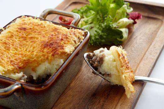 50 Marinated beef & Pork meat pie with a crust of mashed potato hot from the