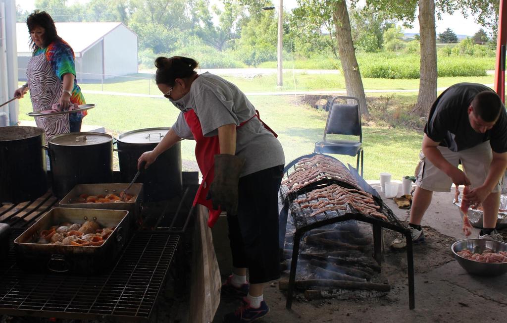 Preparing a feast for a community celebration in the town of Grayhorse, on