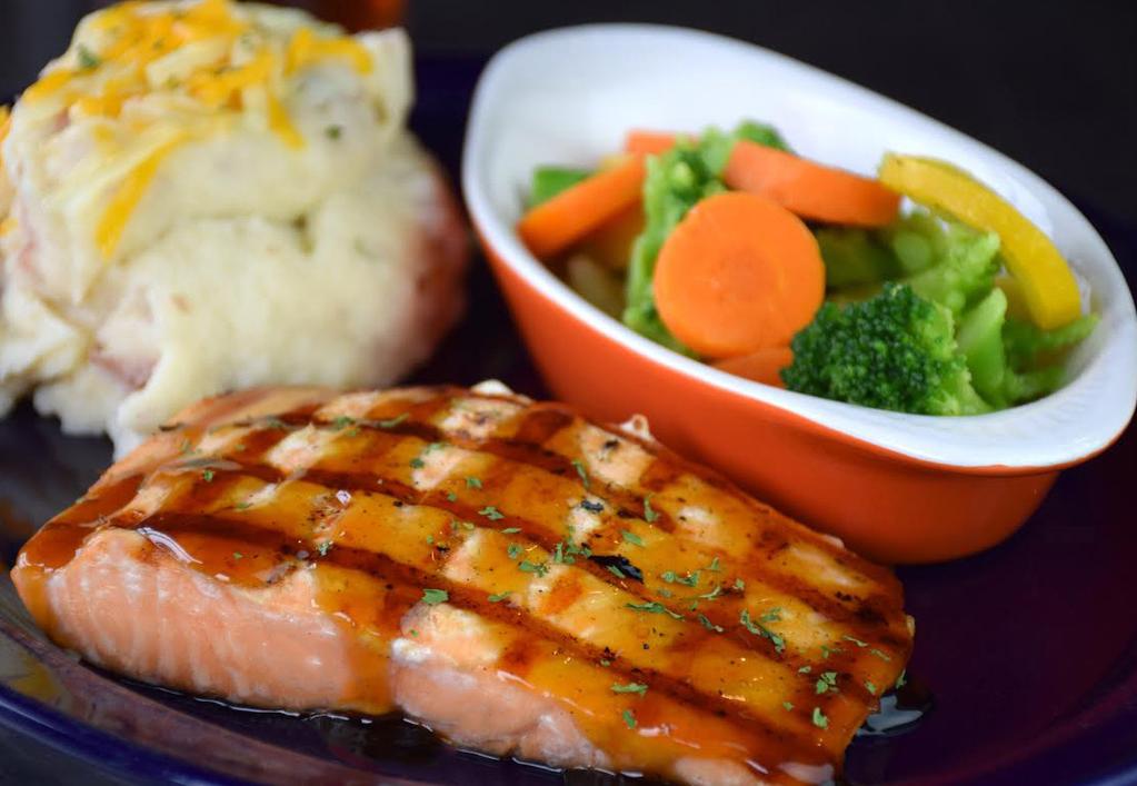 Salmon filet, char grilled and basted with bourbon glaze $16.00 1/2 Portion $9.50 J Smoked Pork Chop Two, 6 oz. boneless pork chops, smoked and char grilled to order served with side of apple BBQ $11.