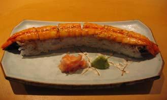 95 (Eel and cucumber covered with shrimp) Lobster Maki. $10.