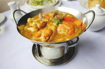 SPECIALTIES OF THE HOUSE Maggi King Prawns... 26.90 King prawns served in our special sweet and spicy sauce. Malaysian Curry in Hot Pot... 23.