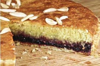 (c) 13 The picture below shows a Bakewell tart. Name the three different component parts of the Bakewell tart. [3] Part 1:.