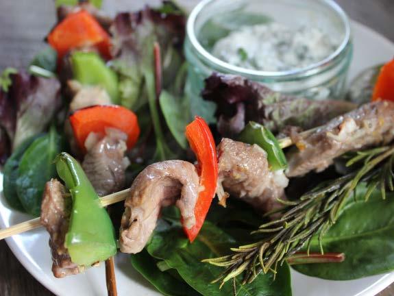 Lamb skewers with a herby yoghurt dip 700g lean boneless lamb, cut into small chunks 1 large onion, grated 2 bay leaves 1 sprig fresh rosemary juice and grated rind of 1 lemon 2 tsps extra virgin