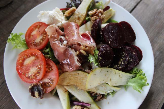 Pear, Parma ham & beetroot salad large handful of mixed salad leaves 2 slices of Parma ham 5 walnuts 2 cooked beetroots, sliced 1/2 a pear, core