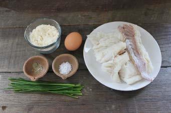 Place the fish in a large bowl and break it up with a wooden spoon. Mix in the egg, chives and salt and pepper.