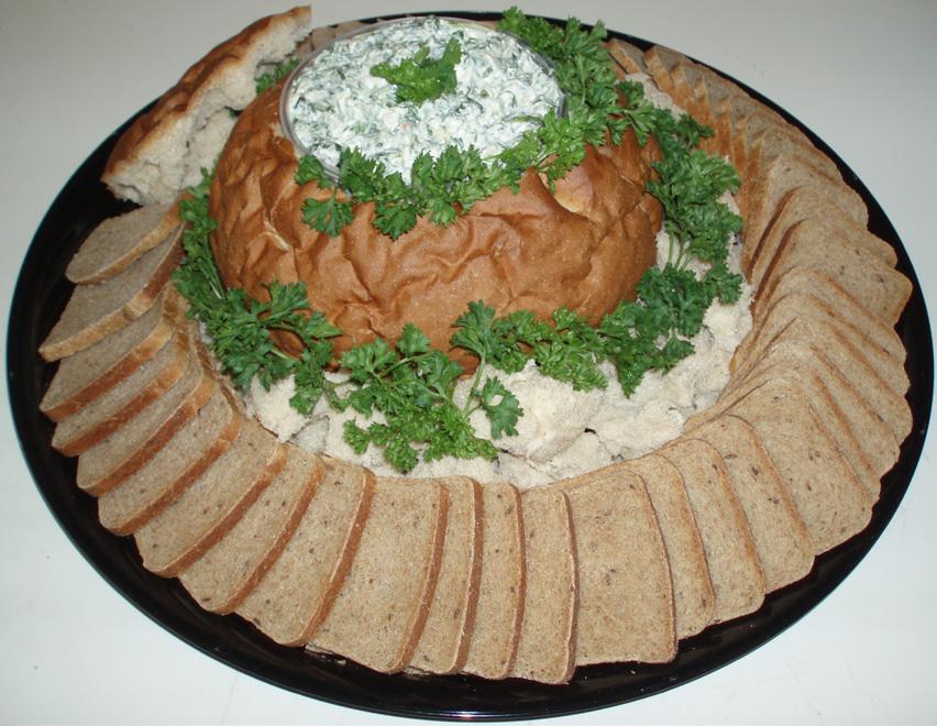 99 Bread in the Round Freshly baked wedges of rye bread filled with our delicious dill or spinach dip.