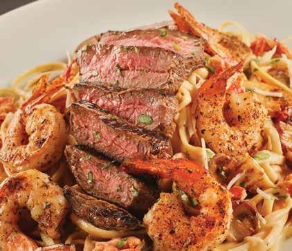 BISTRO STEAK & SHRIMP WITH LOBSTER ALFREDO LINGUINE* steaks & ribs all our steaks are FIRE-GRILLED STEAK * WITH BACON-WRAPPED SHRIMP & LOBSTER SAUCE Marinated 5 oz.