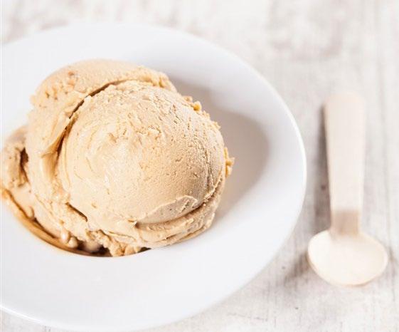 VANILLA ICE-CREAM SUNDAE WITH PRALINE PIECES, CHOCOLATE AND CARAMEL SAUCE Learn to make the ultimate satiny dairy-free vanilla ice-cream that is studded with raw praline