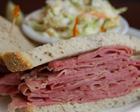 Sandwiches All Sandwiches Served on Rye, Roll, Wheat or Egg Bread, with Pickle and Cole Slaw Whole Half Whole Half Hot Pastrami...15.95... 11.95 Hot Corned Beef...15.95... 11.95 Hot Brisket of Beef.