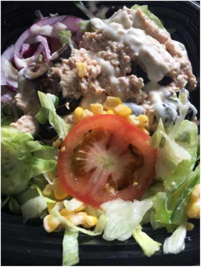 Pack-Up Tuna Salad Lunch Serves: 1 3 slices of Tomato 100g Iceberg Lettuce, shredded 50g tin Sweetcorn, drained 3 slices Onion 3 slices Cucumber 5 Pitted Black Olives, sliced 1 Gherkin, sliced 160g