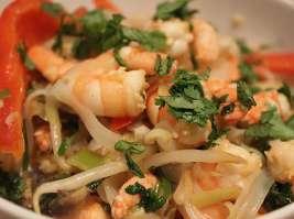 Quick and tasty stir fry 400g peeled tiger prawns or white fish 1 green chilli, finely chopped 3 garlic cloves, finely chopped 30g coriander, finely chopped juice of 1 lime 2 tbsps fish sauce 1 tbsp