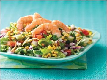 Mexi-licious Shrimp & Corn Salad PER SERVING (entire recipe): 260 calories, 2g fat, 622mg sodium, 39g carbs, 8g fiber, 15g sugars, 24g protein Cook: 5 minutes 3 cups chopped romaine lettuce 1 cup dry