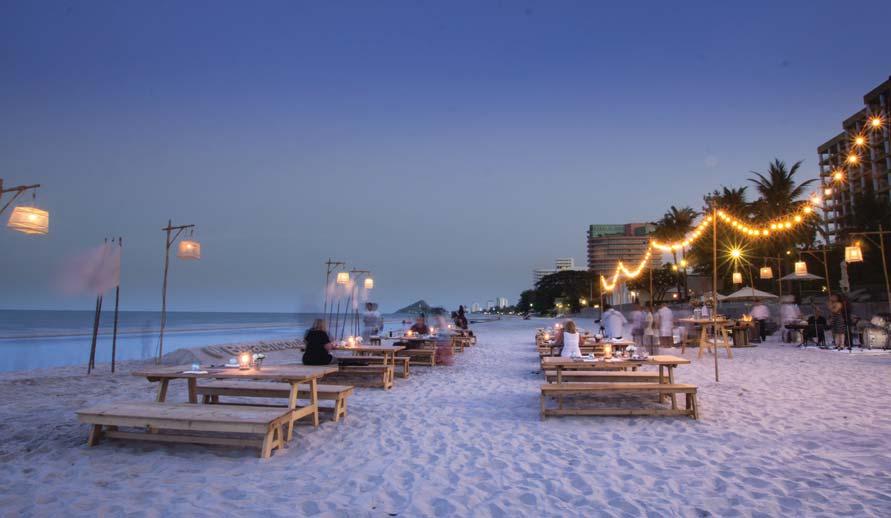 The all-you-can-eat dinner spread is served right on beautiful Hua Hin Beach, featuring