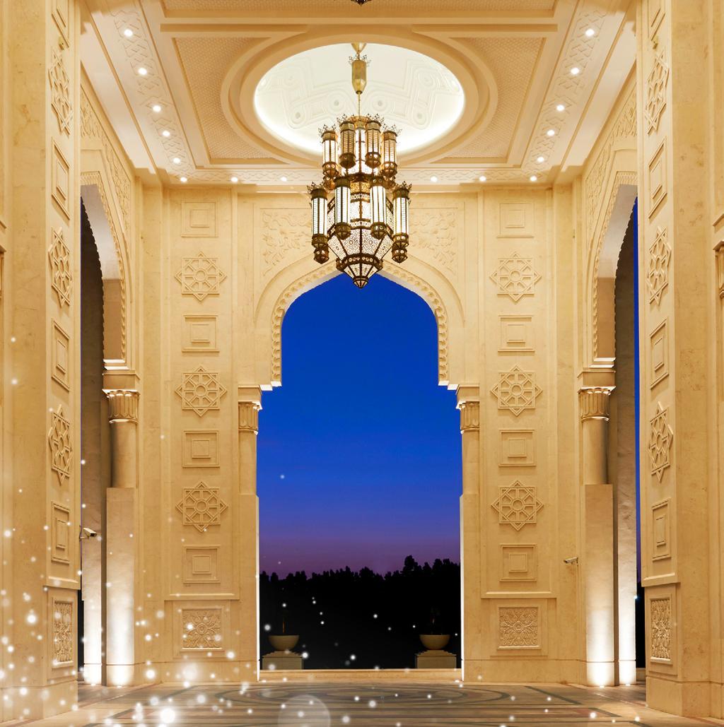 Palace set between the dramatic Hajar Mountains and azure waters of the Arabian Sea.
