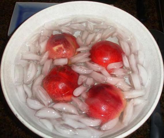 It is easiest to do this in a large bowl of water and gently run your hands through the fruit as they float.