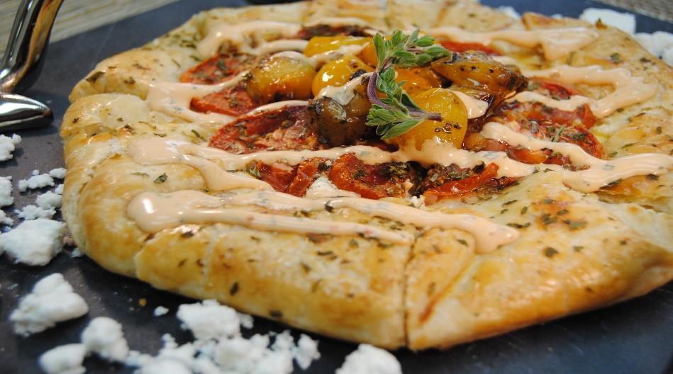 Goat Cheese and Roasted Tomato Galette with Roasted Red Pepper and Basil Sauce 8 each 9 wide circles of savory pie dough rolled ¼ thick 2 lbs. plain goat cheese ½ lb. plain Greek yogurt ½ lb.