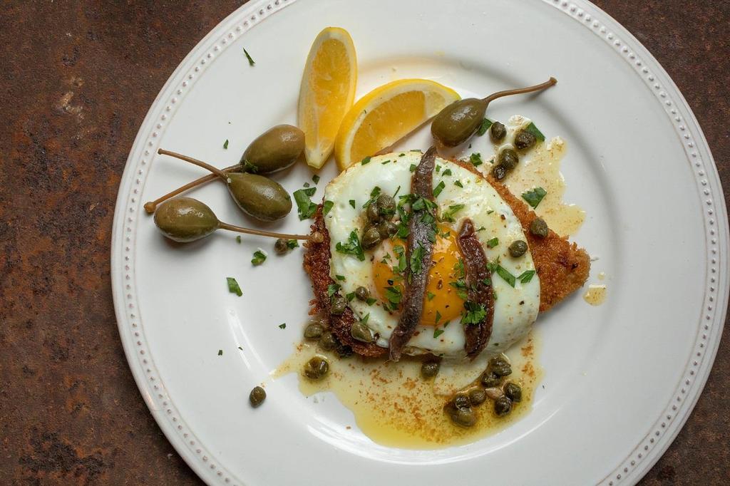 CHICKEN MILANESE Serves 4 Chicken done in the style of Milan Italy. Like all Italian recipes there are as many variations as there are cooks who make it.