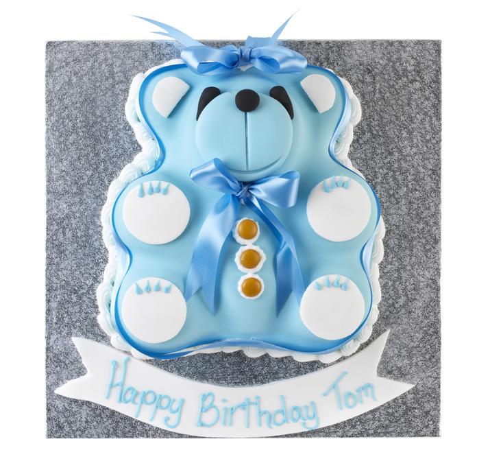A baby shaped sponge cake, perfect as a centre point for any baby shower or birth