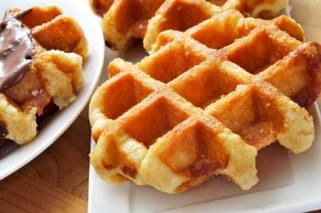 crisp & chewy sweet yeast waffle (1) served with maple flavoured syrup waffles cream or plain vanilla ice cream