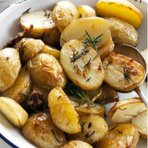 Saturday, 16th June 2018 Roasted Potatoes (DF) 1 pound baby Yukon gold potatoes, or red potatoes 1/2 head garlic 1 tablespoon coconut oil coarse sea salt ground black pepper 1 Preheat the oven to