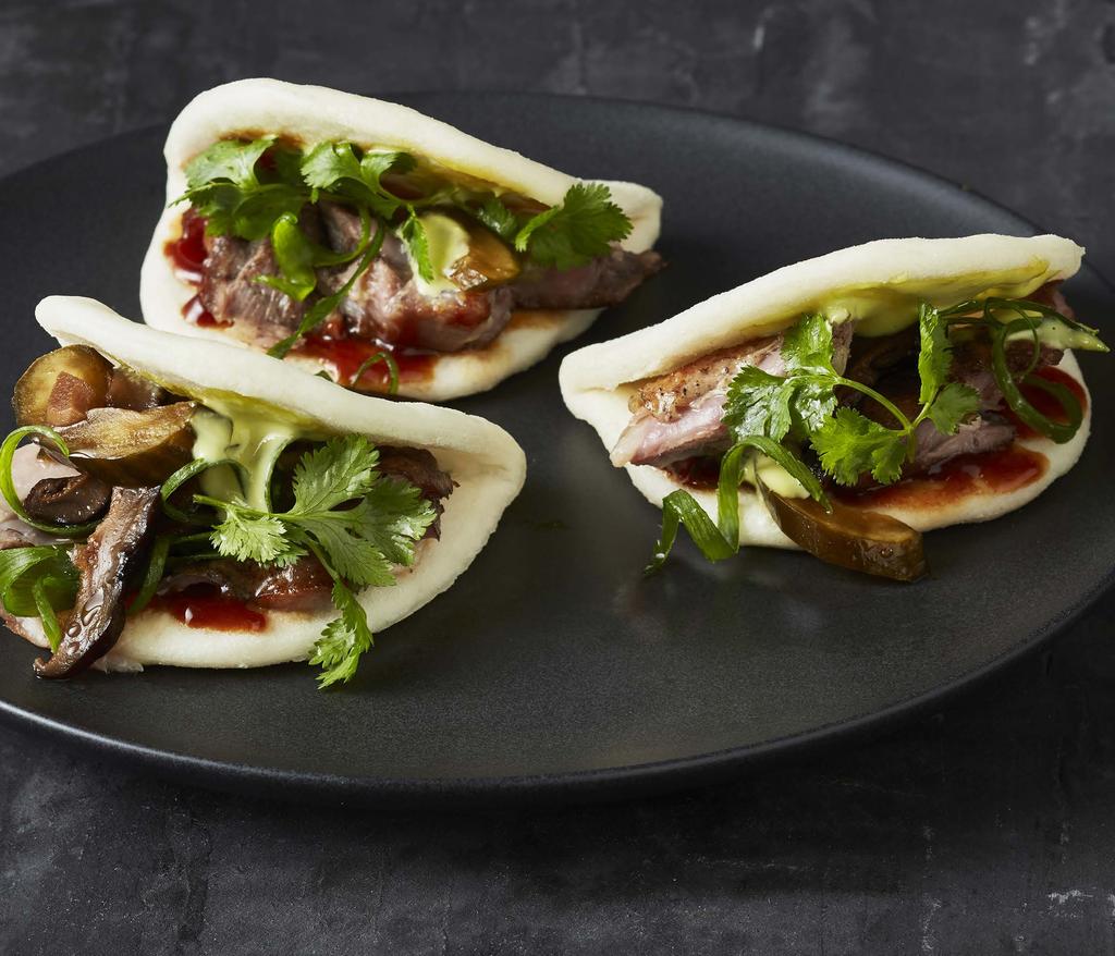 T O SHARE OR TO START Get your taste buds going with a refreshing glass of T Gallant Prosecco Duck Bao (V) option available.