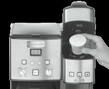If not already turned on, press the power switch located on the side of your unit. Brew buttons will illuminate. 4. Place mug on the drip tray.
