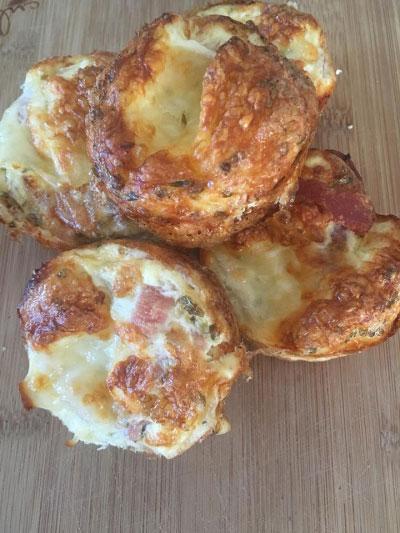 Hash Brown Cups Serves: 5 6 large Egg Whites 2 large Whole Eggs 2 rashers of Lean Bacon 5 mini Mozzarella Balls ½ tsp Dried Oregano 1 cooked Hash Brown, finely chopped 15g Parmesan, grated 1.
