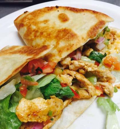$15 KING QUESADILLAS Two quesadillas filled with melted cheese and your choice of steak, chicken, or one of each.