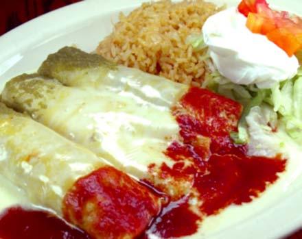 $16 ENCHILADAS MEXICANAS Combination of 6 enchiladas, (two beef, two cheese, two chicken) topped with