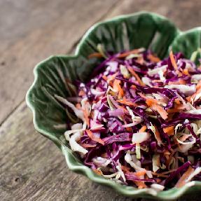 Super Slaw 1cup shredded red cabbage 1cup shredded white cabbage 1 grated carrot 1/4 cup fresh coriander 1 medium red onion thinly sliced 1 tbsp each sunflower seeds, pumpkin seeds and hemp seeds For