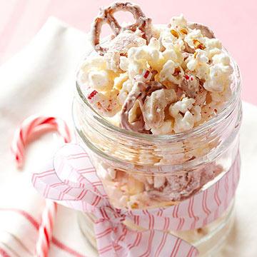 Candy Cane Snack Mix Shallow roasting pan Mixing spoon Medium saucepan Airtight container for storage 7 cups unsalted popped popcorn (remove any un-popped kernels) 3 cups small pretzel twists 2 cups