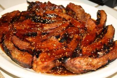 Marinade For the Ribs: 4 racks (8 pounds) baby back ribs 12 garlic cloves, mashed or minced 3 Tbs. Honey-Ginger White Balsamic 3 Tbs. dark brown sugar 1 Tbs. Toasted Sesame Oil 1 Tbs.