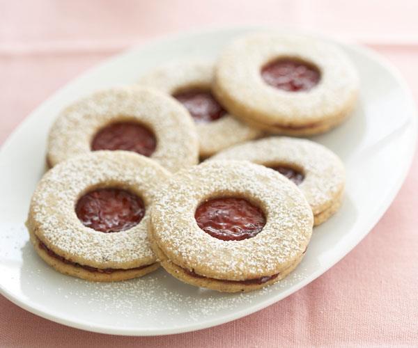 10 LINZER COOKIES JAIME DOWLING 1 cup roasted, peeled hazelnuts 2 cups all-purpose flour 1 ¼ tsp cinnamon ¾ tsp baking powder ½ tsp salt ¼ tsp ground cloves 1 cup unsalted butter, softened 2/3 cup
