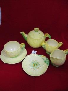 C 15 Carltonware buttercup yellow teapot, milk jug, sugar bowl,