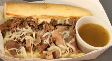 HOT Sandwiches On 8-inch Sweet Italian bread Italian Beef with Au jus $9.99 Premium Italian Beef with Mozzarella Cheese Add Green Peppers, Mushrooms, Onions, Banana Peppers $0.