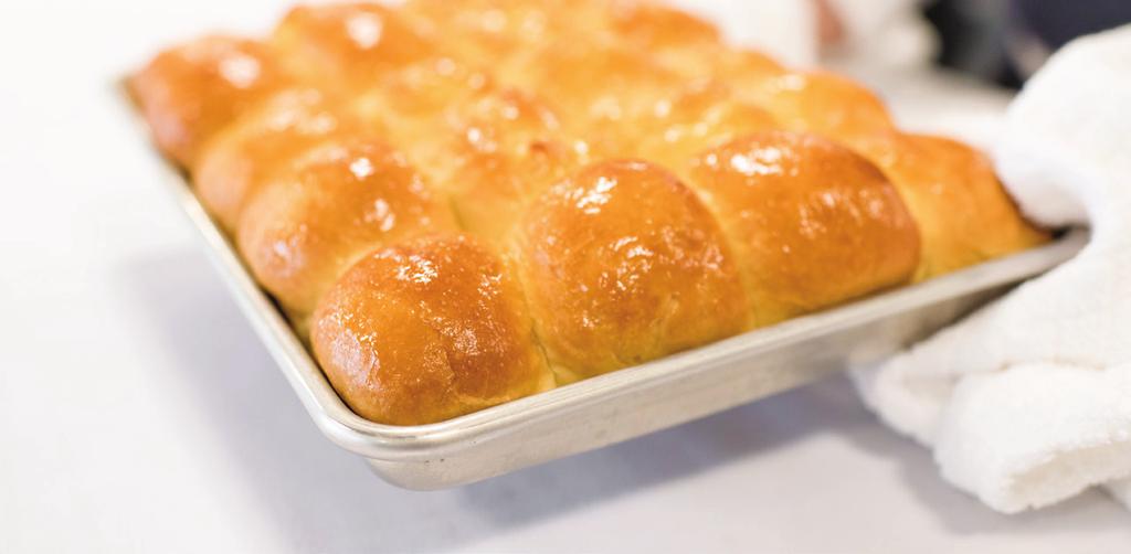 TOPPED WITH BUTTER SIMPLY HOMESTYLE ROLL DOUGH The taste and look of home.