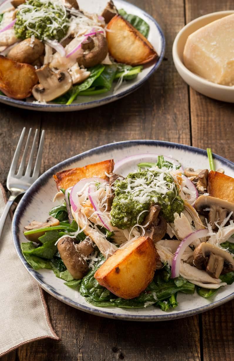 PALEO-FRIENDLY 1 Wilted Spinach Salad with Rotisserie Chicken, Button Mushrooms, Crispy Potatoes & Pesto Rotisserie chicken, crispy Red potatoes and flavorful roasted mushrooms sit atop a bed of