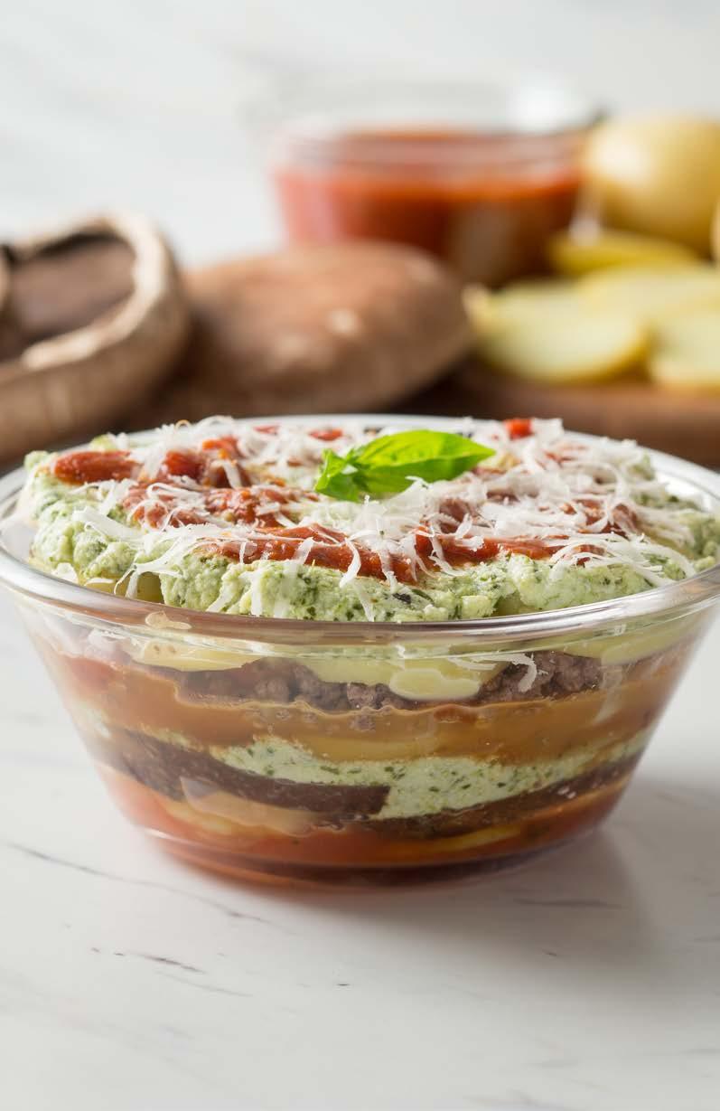 PALEO-FRIENDLY KID-FRIENDLY 2 Blended Mushroom and Potato Lasagna Bowl with Pesto Ricotta Thinly-sliced Yellow potatoes act as noodles, while a mushroom beef mixture acts as the filling for a