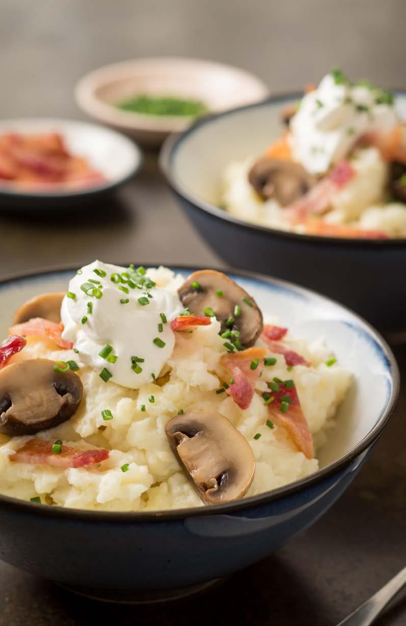 PALEO-FRIENDLY 5 Garlic Mashed Potato Bowl with Bacon and Roasted Mushrooms Creamy, fluffy mashed potatoes meet with savory applewood smoked bacon and meaty mushrooms for an irresistible comfort