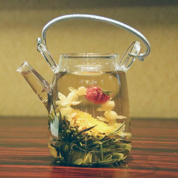 BLOOMING TEAS 盛開的茶 Red amaranths affection blooming tea marigold, globe amaranth, jasmine and green tea buds Royal lily blooming tea Lily, marigold and green tea buds Marigold altar blooming tea