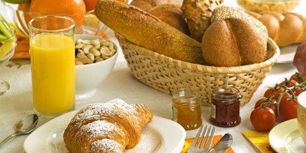 00 per person Downtown Breakfast Buffet Fluffy Scrambled Eggs Crispy Bacon or Sausage Breakfast Potato Cold Cereal, Assorted Breakfast Breads Freshly Baked