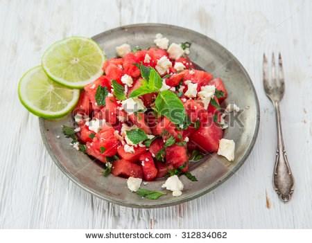 Lunch Watermelon Feta Salad Serves 6-10 15 minutes N/A 15 minutes Easy 1 seedless watermelon, chilled 1/2 C. extra virgin olive oil 3 limes, juiced 1 1/2 tsp. salt 3/4 tsp. black pepper 1 C.