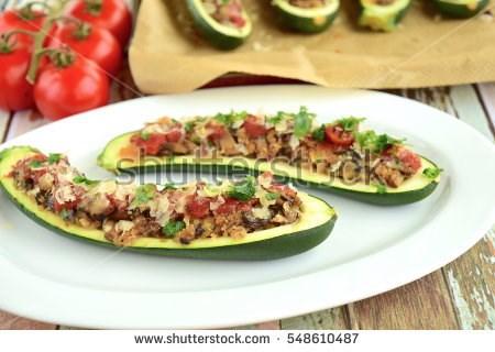 Lunch Baked Zucchini Boats Serves 4 10-15 minutes 35 minutes 50 minutes Easy 3 Medium zucchini ½ C. Pasta sauce ½ lb. ground beef 1 bell pepper, chopped ½ tsp. minced garlic ¼ C.