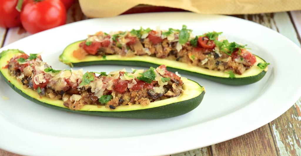 Cook until beef is cooked through. Drain excess liquid off. 4. Place zucchini boats in a baking dish and evenly fill with beef mixture using a spoon.