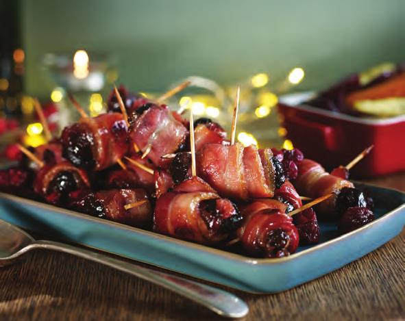 20 makes Devils On Horseback Christmas trimmings tasty finger food 20 pitted prunes 10 rashers streaky bacon 3 tbsp cranberry sauce Balsamic glaze/syrup (optional) 125ml brandy mixed with 125ml water