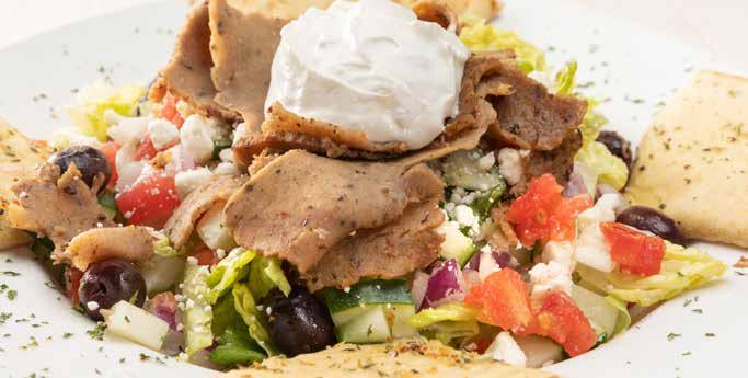 49 GYRO Bigger and Better! An overstuffed Pita with grilled lamb and beef layered with tzatziki sauce, lettuce, tomato, diced red onion, and feta cheese. 10.