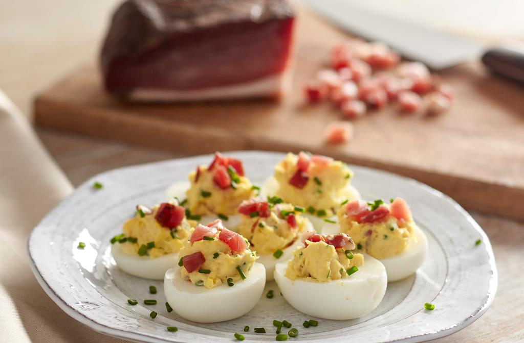 Deviled Eggs with SPECK ALTO ADIGE PGI Difficulty: Easy Serves: 8-12 servings Preparation: 30 minutes Classic deviled eggs soar to new heights with the addition of lightly smoked Speck Alto Adige PGI.