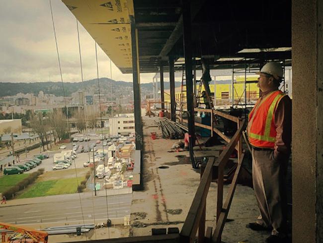 Chef David Machado looks over downtown from the Altabira City Tavern construction site.