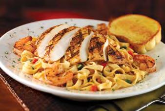 Pastas Cajun Chicken and Shrimp Cajun grilled chicken and shrimp, fettuccine pasta, smoked vegetables and a made-from-scratch Cajun cream sauce. Served with toasted garlic bread.